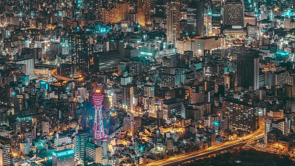 Aerial night view of Osaka, Japan, cover image for Moonbase Capital's Japan search fund market deep dive